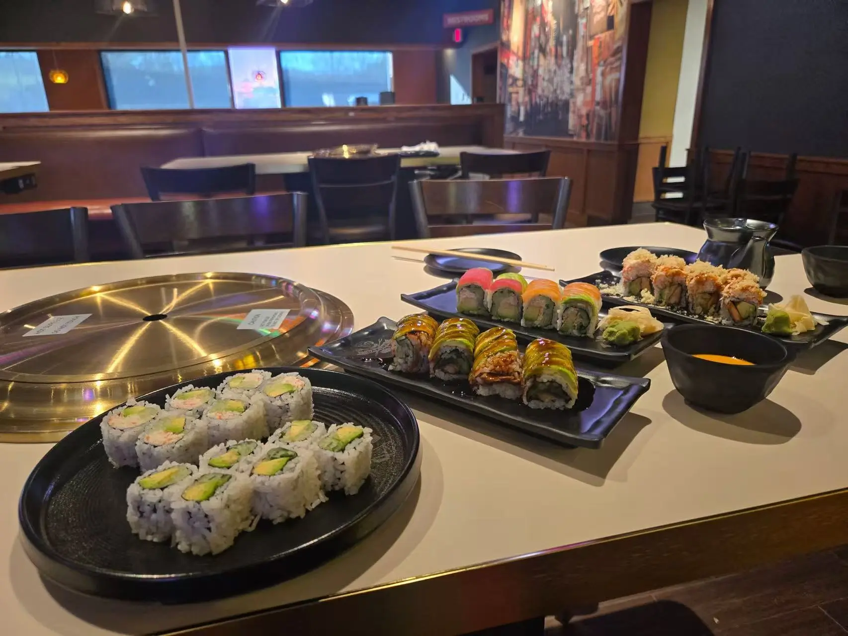 Variety of sushi rolls including California roll, avocado roll, and specialty creative rolls at Daruma BBQ & Sushi AYCE, a Asian Restaurant in Holyoke